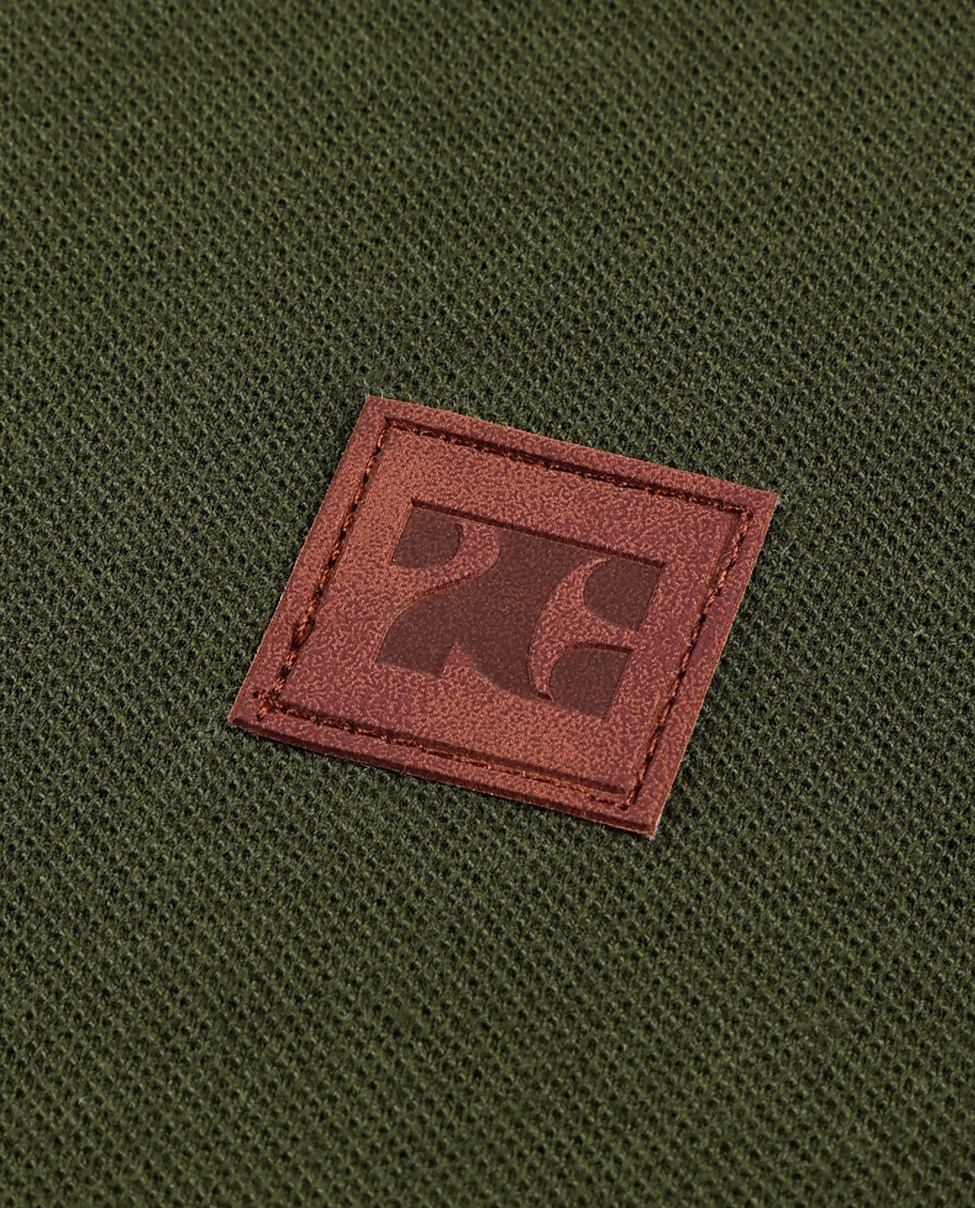 Vintage Olive Pique Knit Shirt with 7C Faux Leather Badge